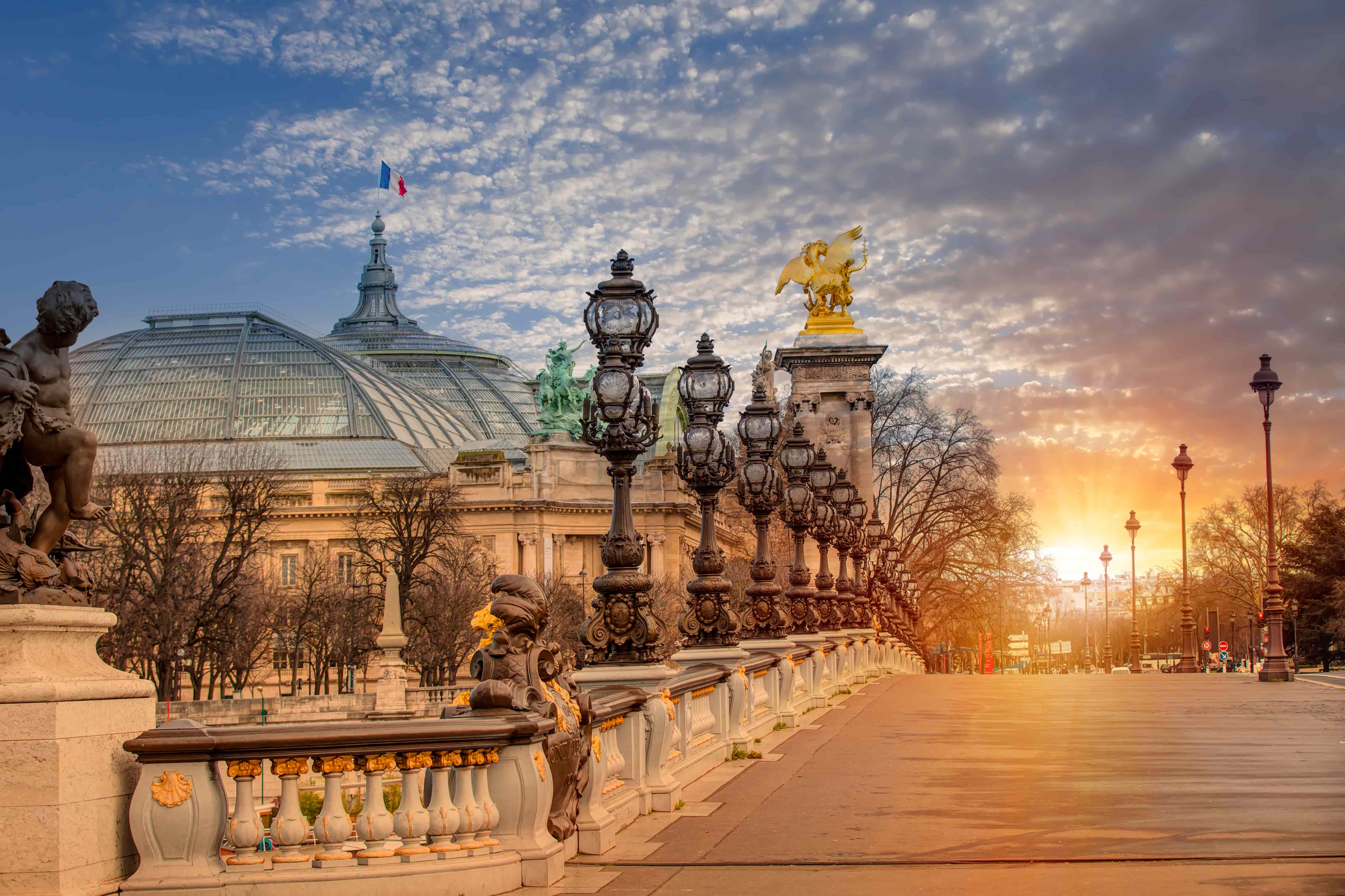 A bridge in Paris at sunset